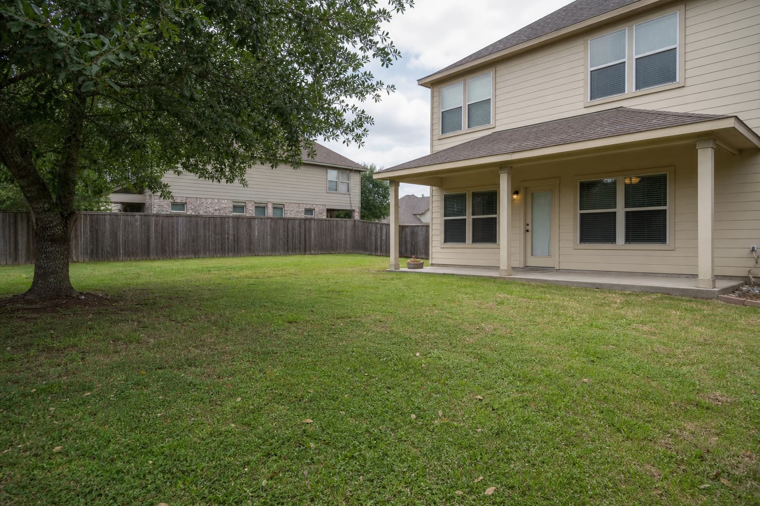 An existing backyard photographed before a makeover